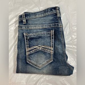 “ROCK REVIVAL” styled WESTERN BOOTCUT DISTRESSED JEANS SIZE 34